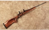 Ruger~M77 MK II~7MM Rem Mag - 1 of 10