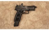 FN~509T~9 MM