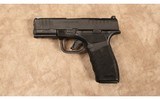 Springfield~Hellcat Pro~9 MM - 2 of 2