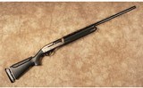 Remington~1100 Competition~12 Gauge - 1 of 10