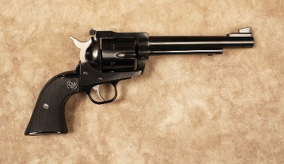 Ruger~New Model Blackhawk~9MM/.357 Mag - Image 1 of 2