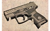 Beretta ~ APX carry ~ 9mm - 2 of 4