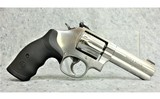 Smith & Wesson ~ 617-6 ~ .22 long rifle - 1 of 2