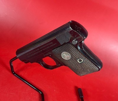 1920 Colt M1908 Vest Pocket Hammerless .25 ACP. Walnut grips. Excellent Condition