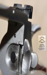 Colt Python Elite with a 4” inch barrel and stainless steel finish.- 9 of 11