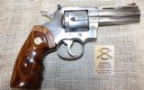 Colt Python Elite with a 4” inch barrel and stainless steel finish.- 5 of 11