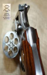 Colt Python Elite with a 4” inch barrel and stainless steel finish.- 10 of 11