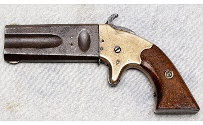 American Arms ~ Derringer ~ .22 & .32 Rimfire