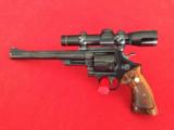 SMITH & WESSON MODEL 29-2
8 3/8"
2X LEAPOLD EER SCOPE - 2 of 9