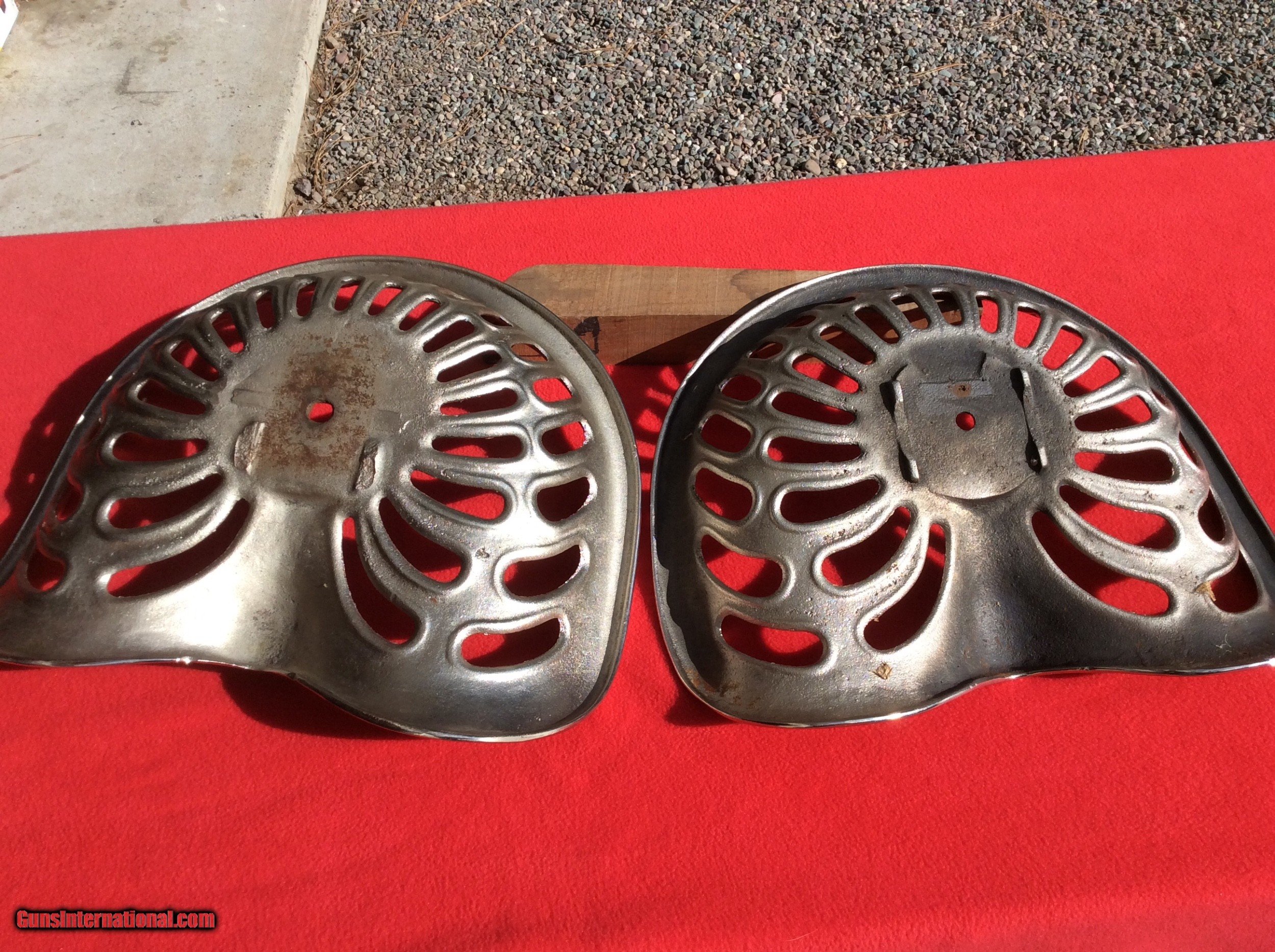 Nickel plated cast iron tractor or implement seats
