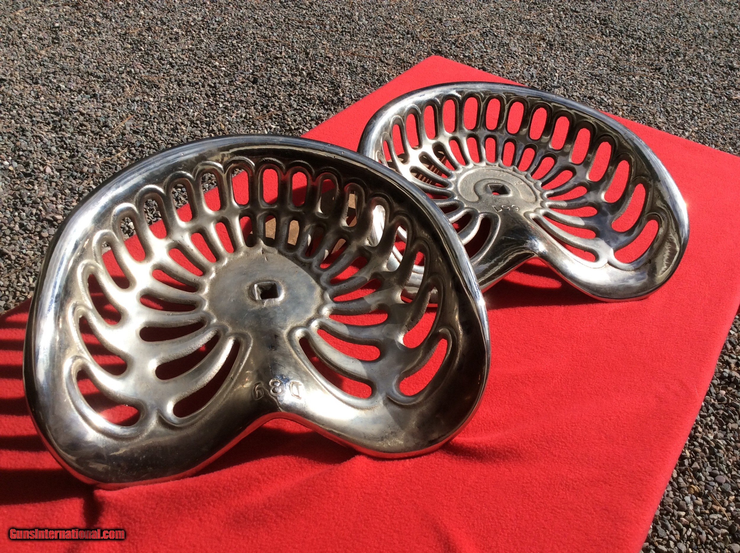 Nickel plated cast iron tractor or implement seats