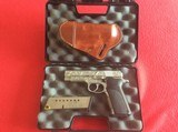 SMITH & WESSON MODEL 1076
10MM
DBL. ACTION AUTO PISTOL,
FULLY ENGRAVED - 5 of 5