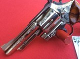 SMITH & WESSON MODEL 29-2 4” BARREL. NICKEL PLATED FACORY ENGRAVED - 1 of 6