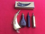 ASSORTMENT OF ITALIAN POWDER FLASKS AND A HORN - 1 of 1
