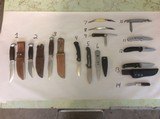 A COLLECTION OF STRAIGHT AND FOLDING KNIVES - 1 of 3