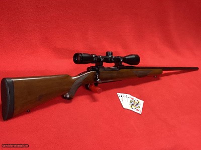 RUGER MODEL 77 ( TANG SAFETY)
338 WIN. MAG. MADE IN 1990