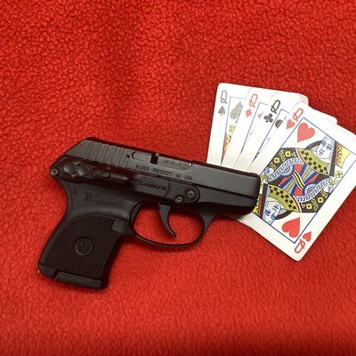 RUGER LCP IN 380 CAL. WITH LASER SIGHT - Image 1 of 8