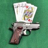 KIMBER MICRO 380380 CAL. WITH LASER SIGHT ROSEWOOD GRIPS NIB - Image 2 of 7