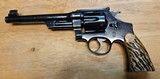 Smith & Wesson
Model: Outdoorsman
Cal: 38 spl - 2 of 4