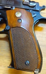 Smith & Wesson
Model: 39
Cal: 9mm - 4 of 7