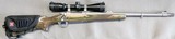 Ruger M77 in 338 RCM with laminated stock and stainless steel 20 BBL