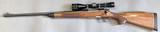 Remington 700 BDL LH rifle in 300 win mag, w/ Leupold scope + magazines - 2 of 9