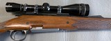 Remington 700 BDL LH rifle in 300 win mag, w/ Leupold scope + magazines - 4 of 9