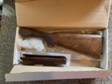 Factory Beretta wood set from a 20 ga 686 Black Oynx QU Gun