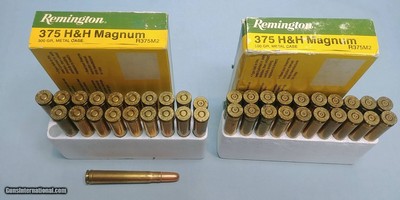 Two Boxes Remington 375 H&H Magnum 300 Grain Metal Case Ammo with 19 Rounds and 21 Empty Brass.
