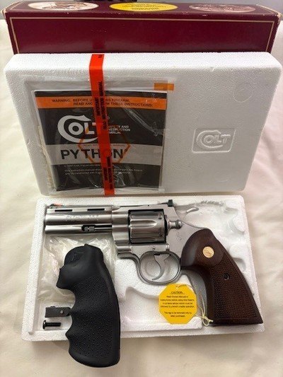 Display Quality Classis Python for Collectors -1989 Stainless 4 in. Colt Python w/2 sets of grips, Box & Docs