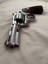 Display Quality Classis Python for Collectors -1989 Stainless 4 in. Colt Python w/2 sets of grips, Box & Docs - 7 of 18