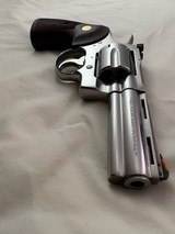 Display Quality Classis Python for Collectors -1989 Stainless 4 in. Colt Python w/2 sets of grips, Box & Docs - 10 of 18