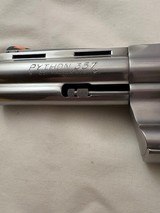 Display Quality Classis Python for Collectors -1989 Stainless 4 in. Colt Python w/2 sets of grips, Box & Docs - 8 of 18