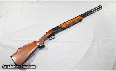 Tikka~ M77K~ 12 ga/.222 rem