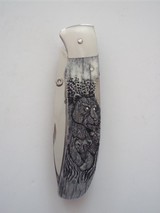 Joseph Prince Folding Knife Giraffe Bone Handle Double Sided Carvings One of A Kind - Never Reproduced
A Masterpiece Knife! - 3 of 4
