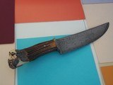 James L. Batson,Jr Moran the Pirate Bowie carved by Paul G. Grussenmeyer Damascus

