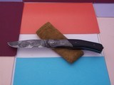 Thierry Le S n cal One of a kind "Thunderbird" Damascus folder Damascus bolsters, rare ebony scales handle