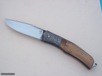 Thierry Le S n cal "one of a kind "Thunderbird" Slipjoint folder, rear pump system, unique Mosaic Bolsters Olive Wood Handle