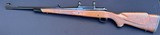 Very Minty Winchester Model 70 in 225 Winchester caliber with an amazing wood stock - 1 of 20