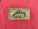 WINCHESTER VERY EARLY GREEN PICTURE BOX OF 32 S&W CENTER FIRE CARTRIDGES. - 1 of 7