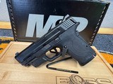 Smith & Wesson M&P9 Shield EZ NTS w/Crimson Trace + Performance Center Cleaning Kit - Image 4 of 9