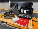 Smith & Wesson M&P9 Shield EZ NTS w/Crimson Trace + Performance Center Cleaning Kit - Image 1 of 9