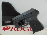 Ruger LCP 380 with Viridian Laser and Soft Carry Holster - 1 of 3