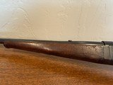 Savage 99 Takedown .303 SPlain walnut forend and straight grip buttstock ending with a factory buttplate.Plain walnut forend and straight grip buavage - 13 of 19