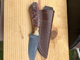 Custom Sheath Knife by Bill Akers
Beautiful Damascus Blade and Gorgeous Handles with Certificate of Authenticity - 1 of 6