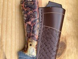 Custom Sheath Knife by Bill Akers
Beautiful Damascus Blade and Gorgeous Handles with Certificate of Authenticity - 2 of 6