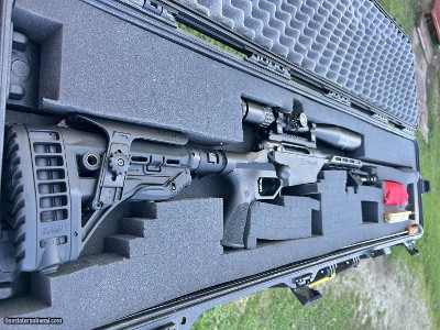 Savage .338 Lapua with a 15X55X52mm Night force scope,