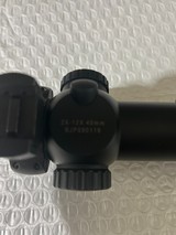 Burris Six X 2X12X40MM, Lighted cross hairs, in Excellent Condition with rings included.  30MM Tube - Image 5 of 6