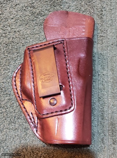 Alessi Hard Shell Talon IWB Holster for Glock 19/23
RH
Brown leather.
Brand new.
1990s Mfg.
