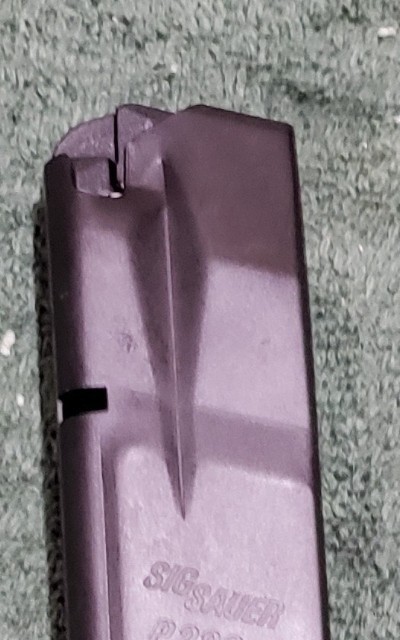 Sig Sauer Pre-Ban P229 40 S&W 12 round magazine. Early 1990s mfg. German made. Brand new.